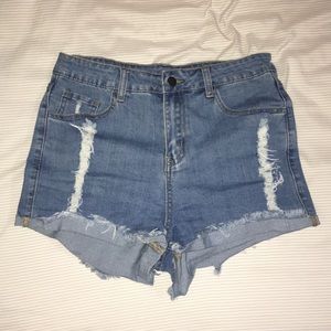 High waisted distressed denim shorts
